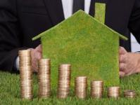 Welche Steuer wird aus dem Verkauf eines Grundstücks durch eine Einzelperson gezahlt und wie wird sie berechnet?